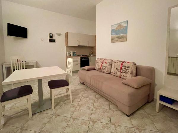 Bb-Ld : photo 2 de la chambre appartement - vue sur jardin