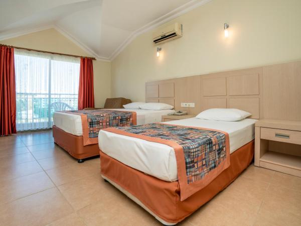 Gardenia Beach : photo 4 de la chambre chambre double
