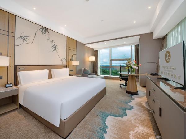 Oriental Ginza Hotel Shenzhen : photo 1 de la chambre chambre lit king-size deluxe - vue sur mer