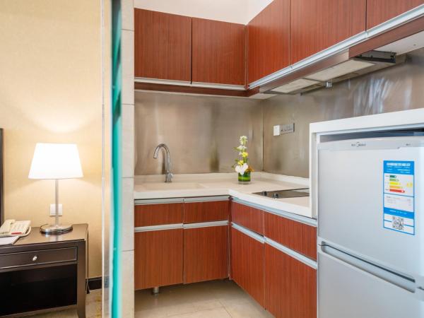 Oriental Ginza Hotel Shenzhen : photo 7 de la chambre chambre lit king-size deluxe - vue sur mer