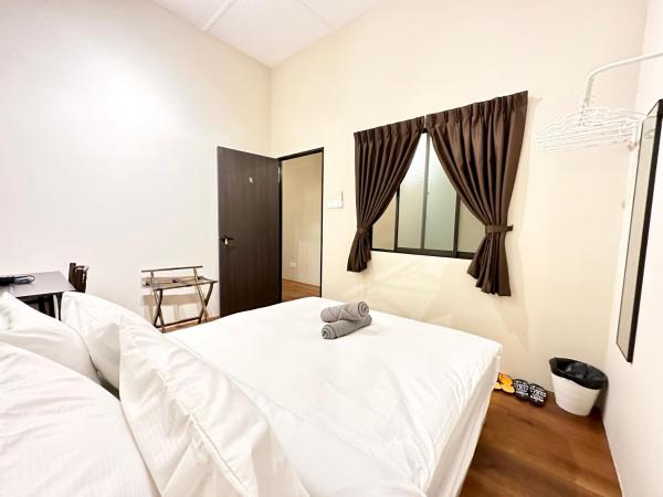 Madras Inn 58-1 : photo 7 de la chambre chambre double avec salle de bains commune