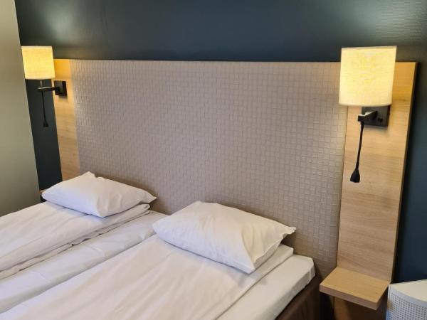 City Living Schøller Hotel : photo 1 de la chambre chambre lits jumeaux standard