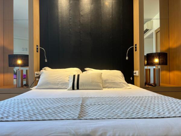 Hotel Revellata & Spa : photo 4 de la chambre m – chambre double ou lits jumeaux – côté piscine