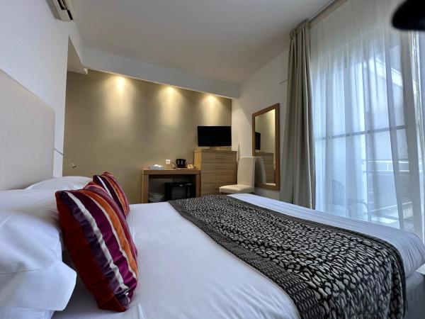 Hotel Revellata & Spa : photo 2 de la chambre xl – chambre triple avec balcon