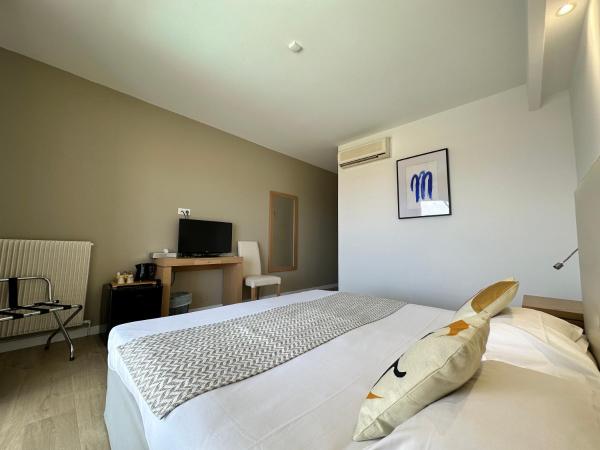 Hotel Revellata & Spa : photo 4 de la chambre m - chambre double ou lits jumeaux - balcon avec vue sur mer