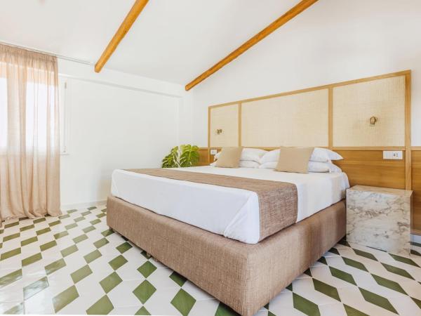 SorrentoVibes - Boutique Suites 186 : photo 4 de la chambre suite deluxe avec lit king-size
