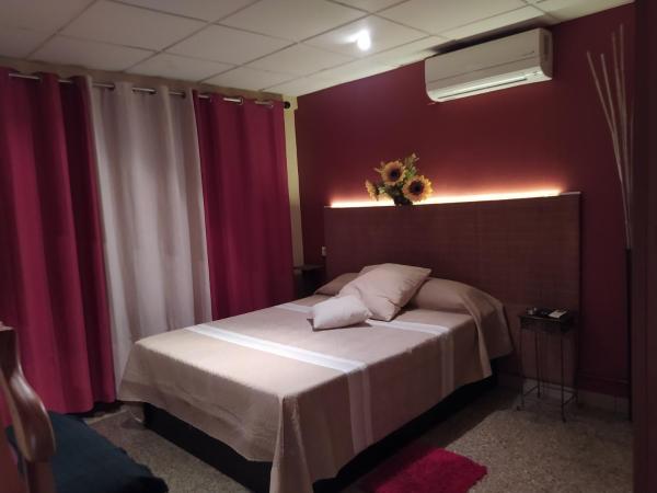 Hostal Happystay : photo 9 de la chambre chambre lit queen-size deluxe