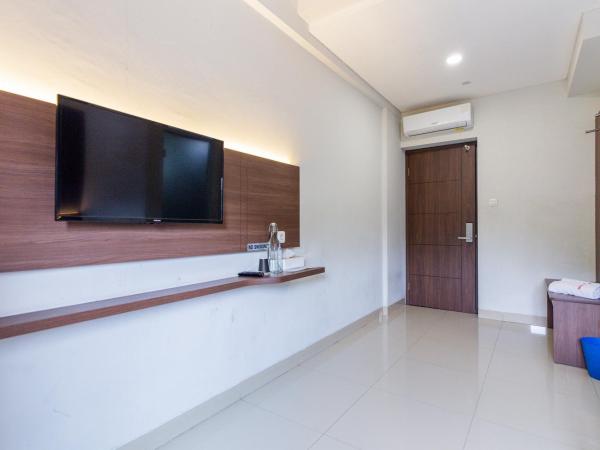 Urbanview Hotel Slipi Inn Palmerah : photo 5 de la chambre chambre lits jumeaux supérieure