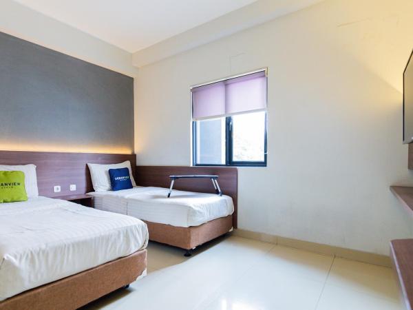 Urbanview Hotel Slipi Inn Palmerah : photo 4 de la chambre chambre lits jumeaux supérieure