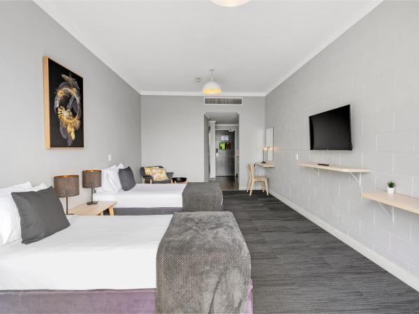 Gilligan's Hotel & Resort Cairns : photo 1 de la chambre chambre lits jumeaux standard avec salle de bains privative

