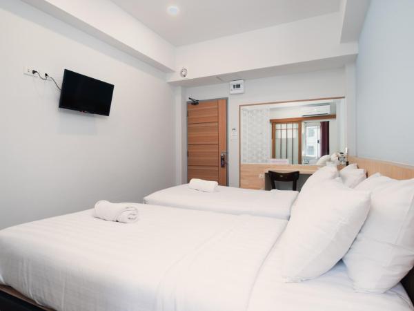 Manee Cool Mueang : photo 1 de la chambre chambre lits jumeaux standard