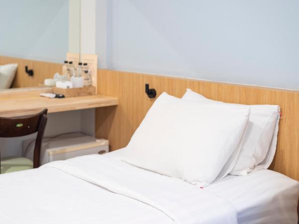 Manee Cool Mueang : photo 3 de la chambre chambre lits jumeaux standard