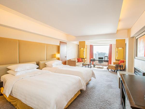 Shangri-La Beijing : photo 3 de la chambre hébergement deluxe avec 2 lits jumeaux - aile jardin