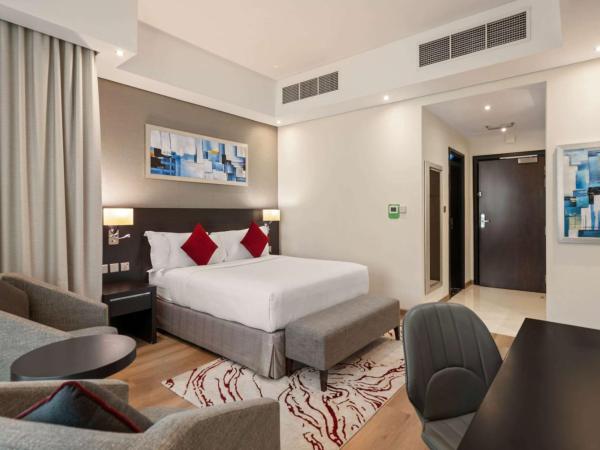 Ramada by Wyndham Dubai Barsha Heights : photo 1 de la chambre chambre lit king-size deluxe - non-fumeurs