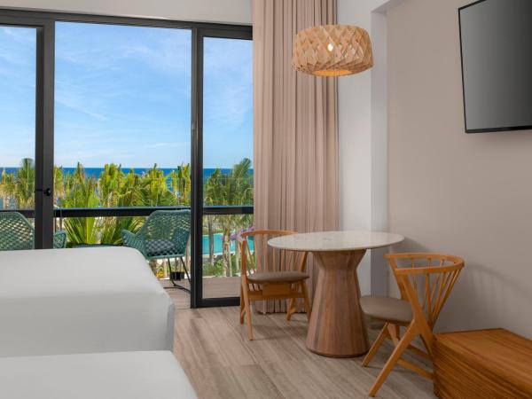 Hilton Tulum Riviera Maya All-Inclusive Resort : photo 7 de la chambre enclave queen room with two queen beds and ocean view