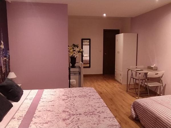 Hostal Happystay : photo 4 de la chambre chambre quadruple avec salle de bains privative