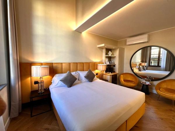 Renascentia in Florence - Adults Only : photo 10 de la chambre suite lit king-size avec baignoire spa