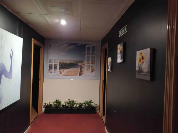 Hostal Happystay : photo 2 de la chambre chambre quadruple avec salle de bains privative