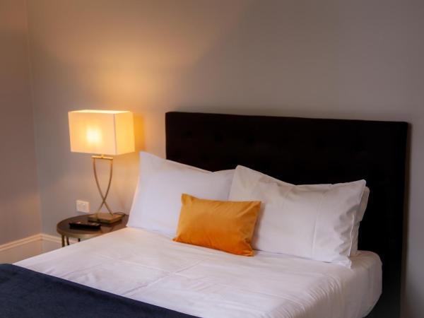 Bayswater Boutique Lodge : photo 2 de la chambre studio double supérieur avec terrasse et salle de bains commune