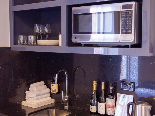 Bayswater Boutique Lodge : photo 4 de la chambre studio lits jumeaux/triple supérieur avec salle de bains privative