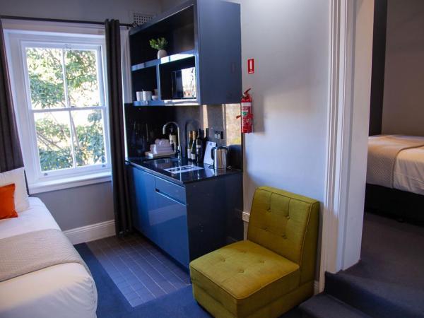 Bayswater Boutique Lodge : photo 5 de la chambre suite lits jumeaux/triple exécutive avec salle de bains commune