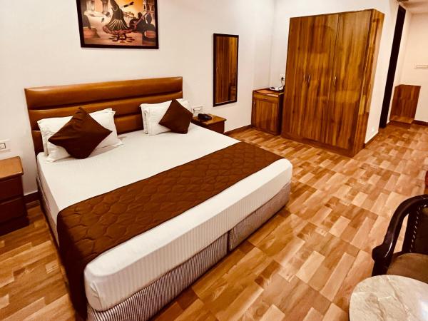 Amora Rooms Dwarka : photo 7 de la chambre deluxe