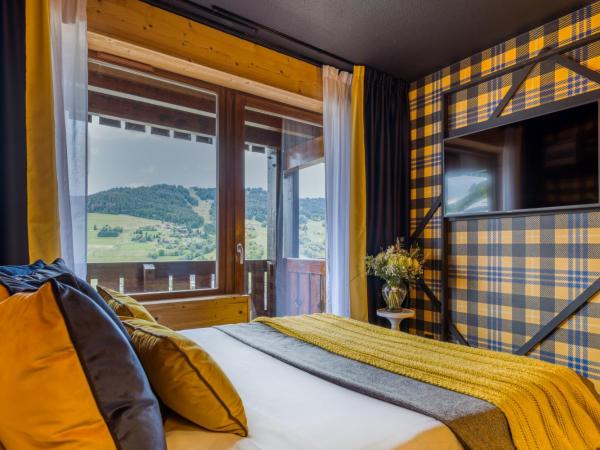 Mamie Megève : photo 1 de la chambre chambre triple deluxe - vue sur ville