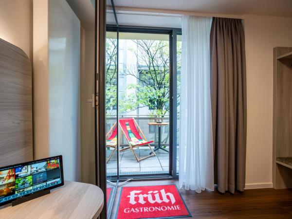 Eden Hotel Früh am Dom : photo 1 de la chambre chambre simple avec balcon