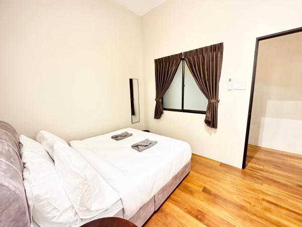 Madras Inn 58-1 : photo 7 de la chambre chambre double avec salle de bains commune