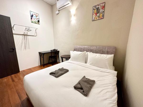 Madras Inn 58-1 : photo 10 de la chambre chambre double avec salle de bains commune