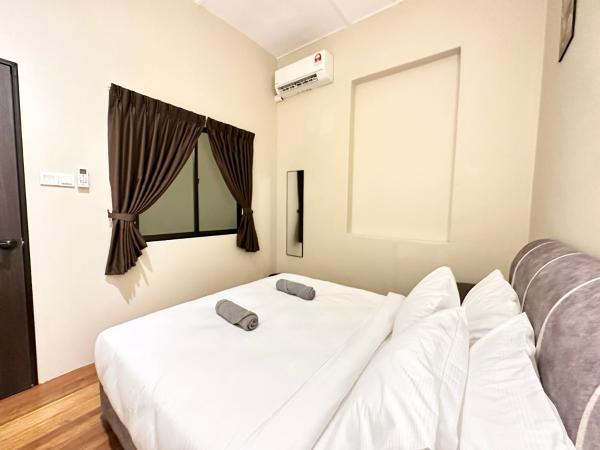 Madras Inn 58-1 : photo 8 de la chambre chambre double avec salle de bains commune