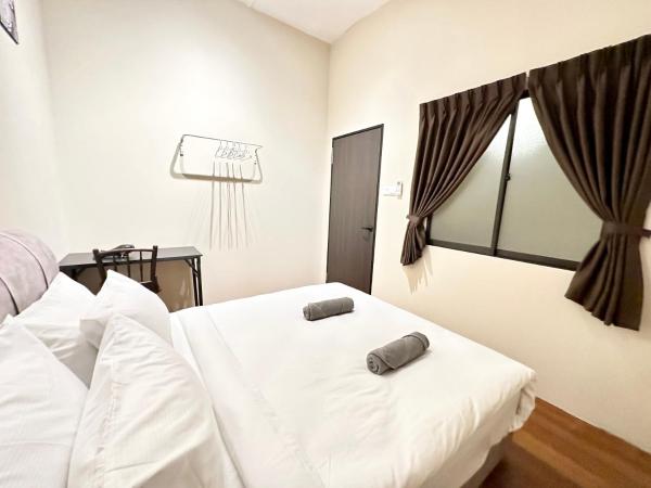 Madras Inn 58-1 : photo 7 de la chambre chambre double avec salle de bains commune