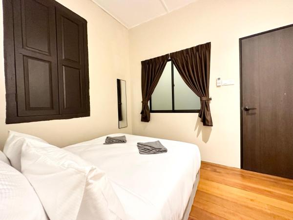 Madras Inn 58-1 : photo 7 de la chambre chambre double avec salle de bains commune