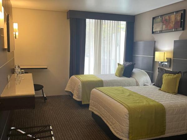 Hotel Real Alameda de Queretaro : photo 3 de la chambre chambre lits jumeaux pour personnes à mobilité réduite