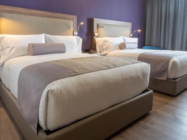 Sheraton Guadalajara Expo : photo 5 de la chambre deluxe queen room with two queen beds and balcony - city view