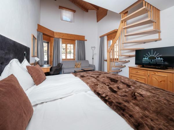 Hotel Bünda Davos : photo 2 de la chambre chambre familiale avec balcon