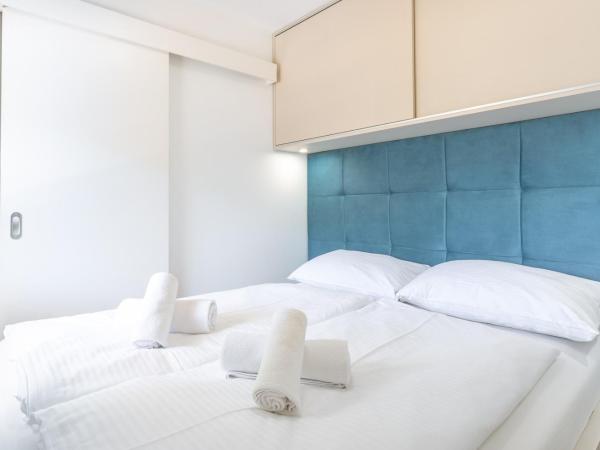 Camping Glavotok : photo 6 de la chambre bungalow supérieur