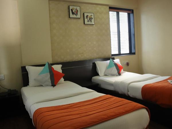 Hotel Serene Viman Nagar : photo 2 de la chambre chambre lits jumeaux deluxe