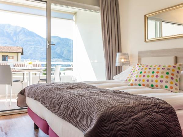 Smart-HOTEL MINUSIO, a Benvenuti Hotel : photo 1 de la chambre chambre double avec balcon au sud