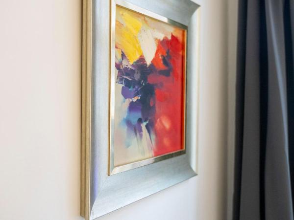 A Hotels City : photo 8 de la chambre chambre double avec salle de bains commune