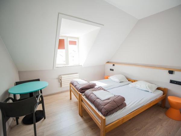 Jacques Brel Youth Hostel : photo 1 de la chambre chambre lits jumeaux