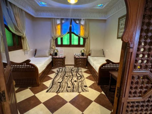 Jnane Malak hôte : photo 9 de la chambre appartement - vue sur piscine 