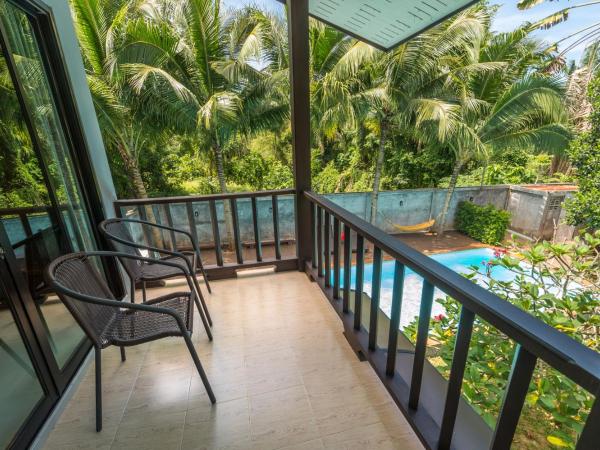 Lanta Thip House by Swiss-Belhotel - SHA Plus : photo 5 de la chambre chambre double cabine

