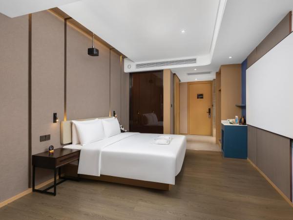 Atour Hotel Chongqing Guanyinqiao Flower Garden : photo 1 de la chambre superior double room with movie 