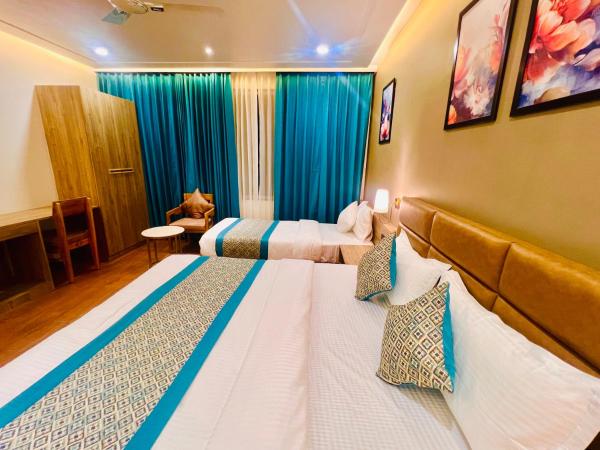 ROYAL RESIDENCY UDAIPUR : photo 5 de la chambre chambre triple classique