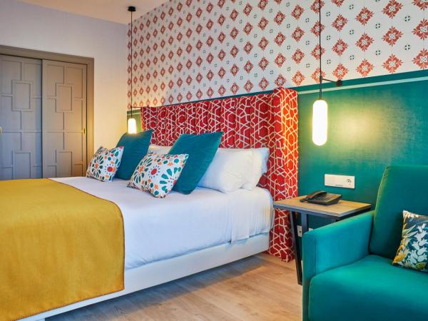 Hesperia Sevilla : photo 1 de la chambre chambre triple confort