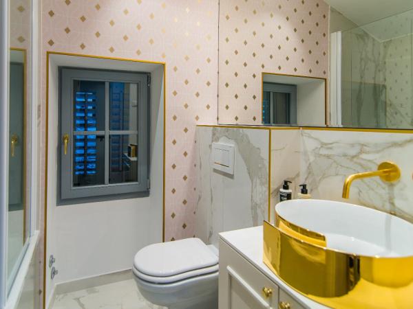 The Melegran : photo 9 de la chambre deluxe family room with two queen beds