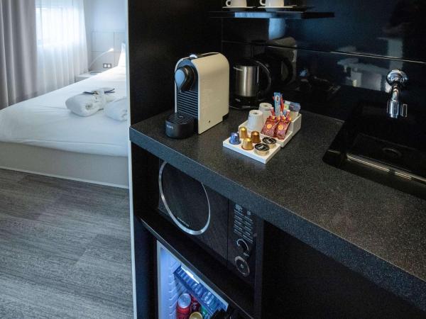 Novotel Suites Luxembourg : photo 9 de la chambre suite exécutive avec 1 lit double et 1 lit simple