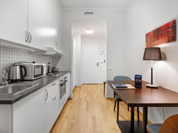 Enter City Apartment Hotel : photo 8 de la chambre chambre lits jumeaux supérieure avec cuisine