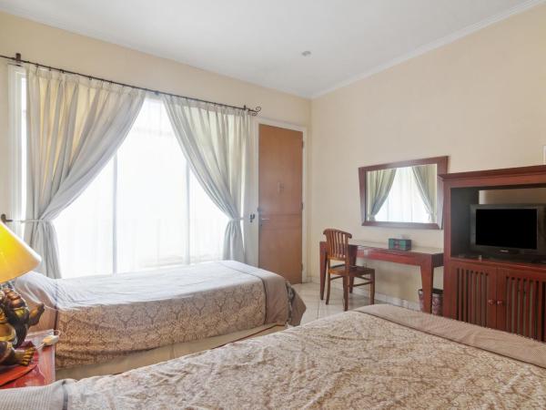 Puri Sawo Manila Residence : photo 4 de la chambre chambre lits jumeaux spacieuse